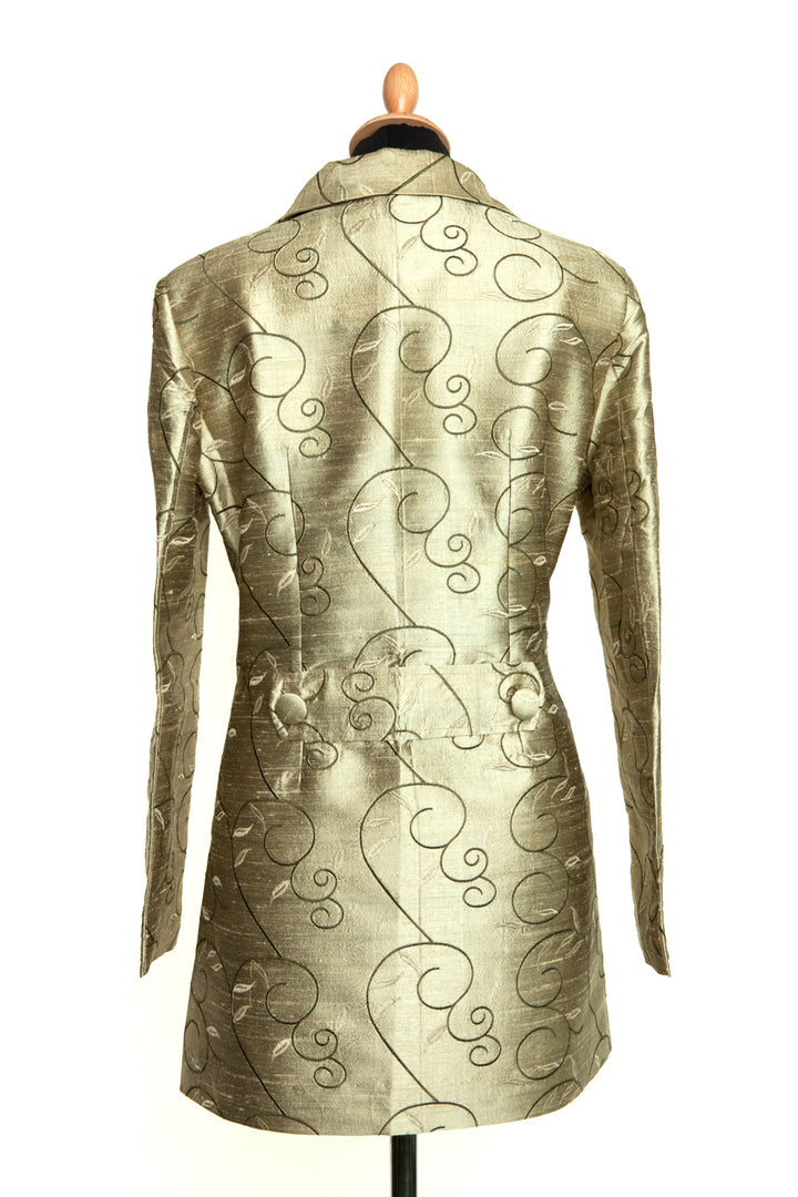 Back of a silk embroidered gold jacket. 