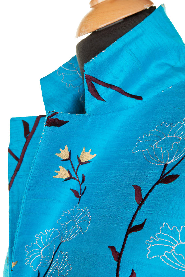 Detail of a silk jacket with lifted collar. 