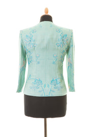 Short cashmere jacket in pale blue. 