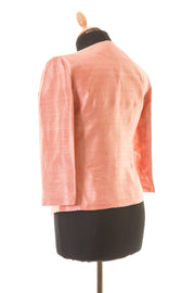 Short silk jacket in blush. 