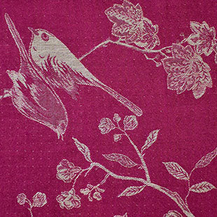 red fabric with flowers and birds 