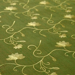 bright green and gold embroidered silk fabric