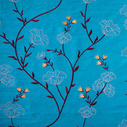 bright turquoise embroidered silk fabric