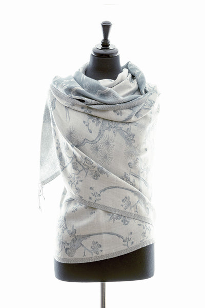 grey shawl with flower pattern. 