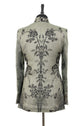 Back of a classic jacket for women. Grey jacket with black flowers.
