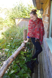 Shibumi cashmere shawl in venetian red worn casually