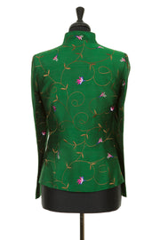 Womens short jacket with a soft curved collar and half belt, in a rich emerald green embroidered silk