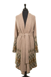 Beige long cardigan with a belt on a mannequin. 