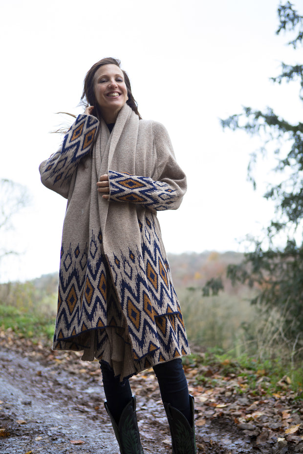 Wool shaw with matching cardigan worn on a lady. 